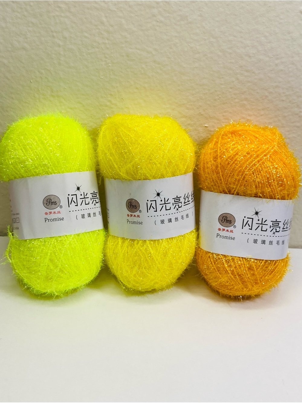 149 g / 5.24 oz Promise Shimmer Scrubby Yarn- Neon Yellow, Bright Yellow, Orange